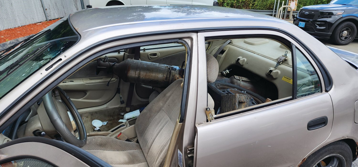 RIDING SHOTGUN: The suspect’s tiny car was so small that he had to remove the passenger seat to fit the exhaust systems he stole. When a Warwick business owner tracked down the suspect he caught stealing from his property, the catalytic converter was still in the Toyota, riding shotgun.